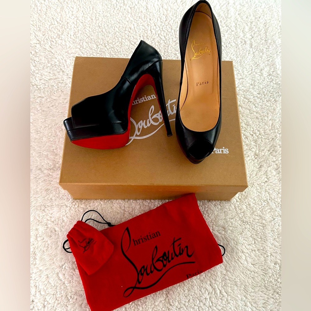Authentic Christian Louboutin size 36 ( women’s 5.5 ) heels .